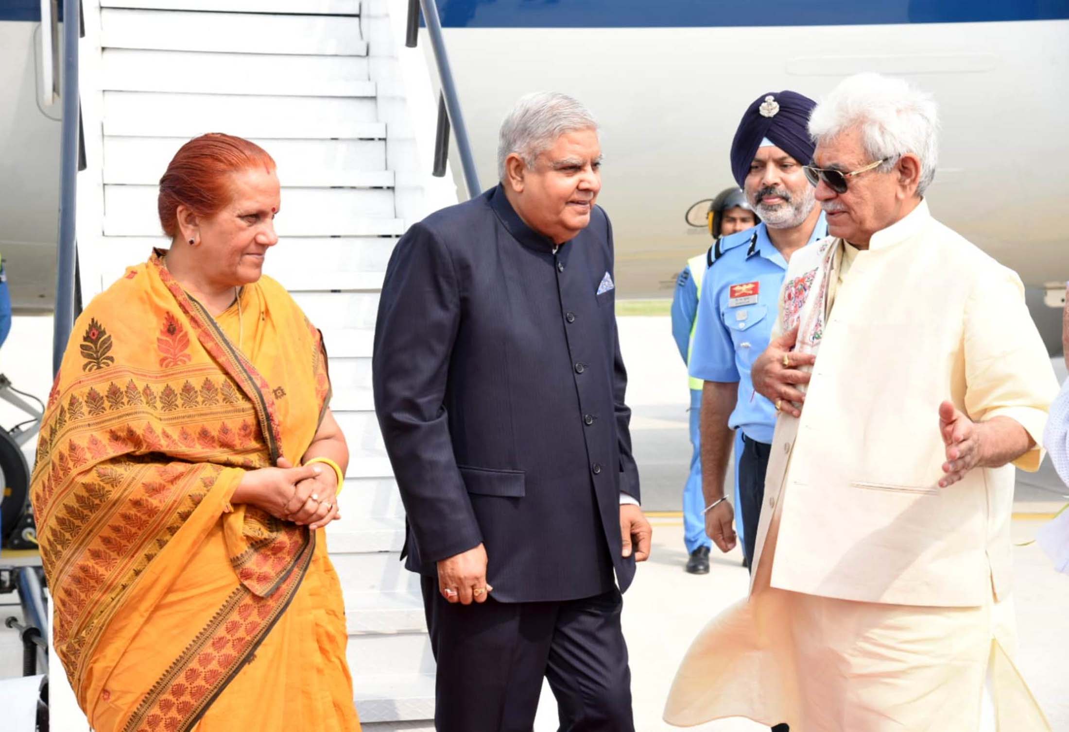  The Vice President, Shri Jagdeep Dhankhar and Dr. Sudesh Dhankhar being welcomed by Lieutenant Governor of the Union Territory of Jammu & Kashmir, Shri Manoj Sinha, accompanied by other dignitaries in Jammu on June 22, 2023.