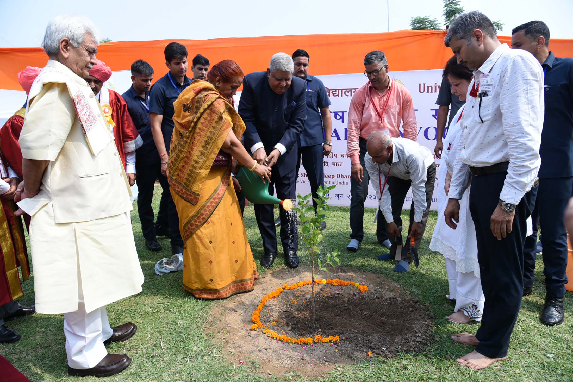 The Vice President, Shri Jagdeep Dhankhar and Dr. Sudesh Dhankhar planting a sapling at the premises of University of Jammu, in Union Territory of Jammu and Kashmir on June 22, 2023.