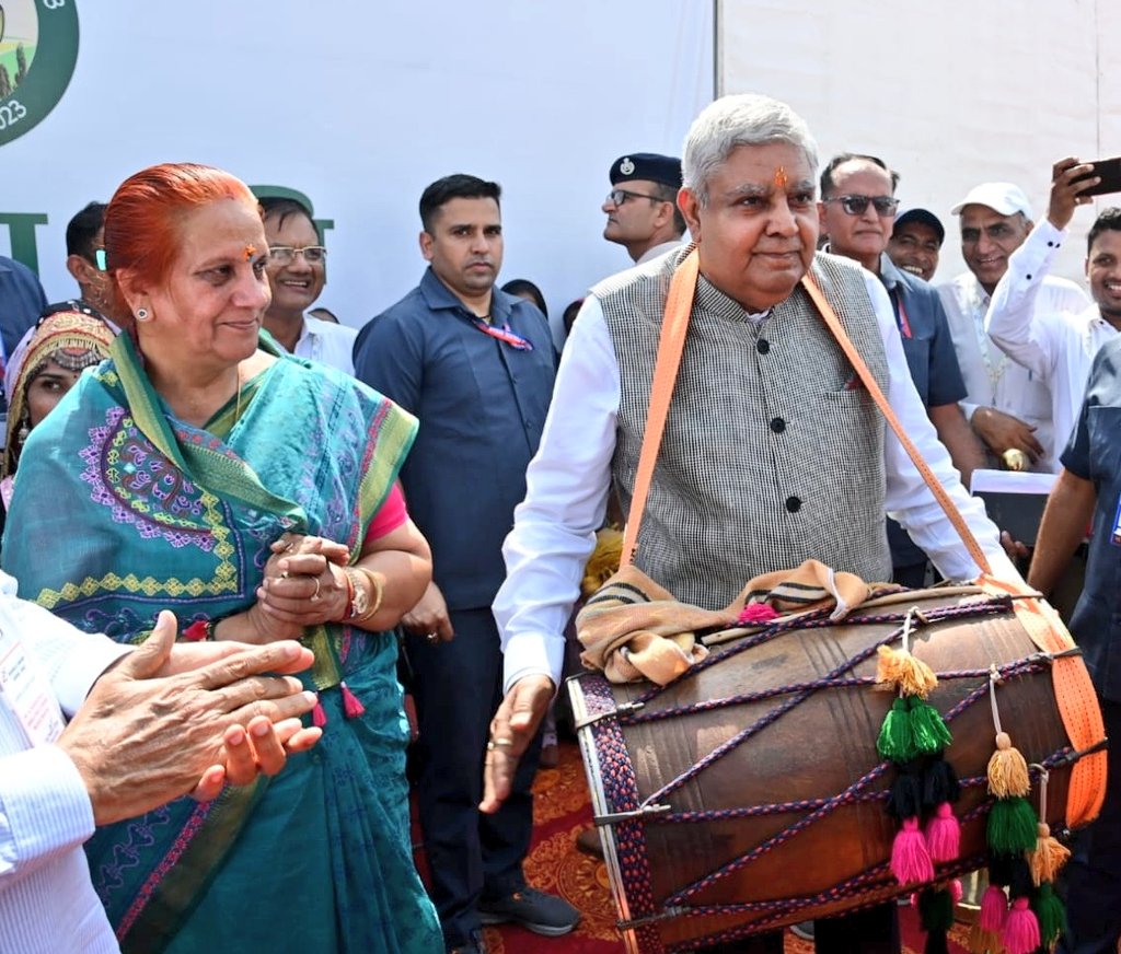 The Vice-President, Shri Jagdeep Dhankhar playing traditional musical instruments at the Krishi Vikas Mela organized at Chaudhary Charan Singh Haryana Agricultural University in Hisar, Haryana on October 8, 2023.