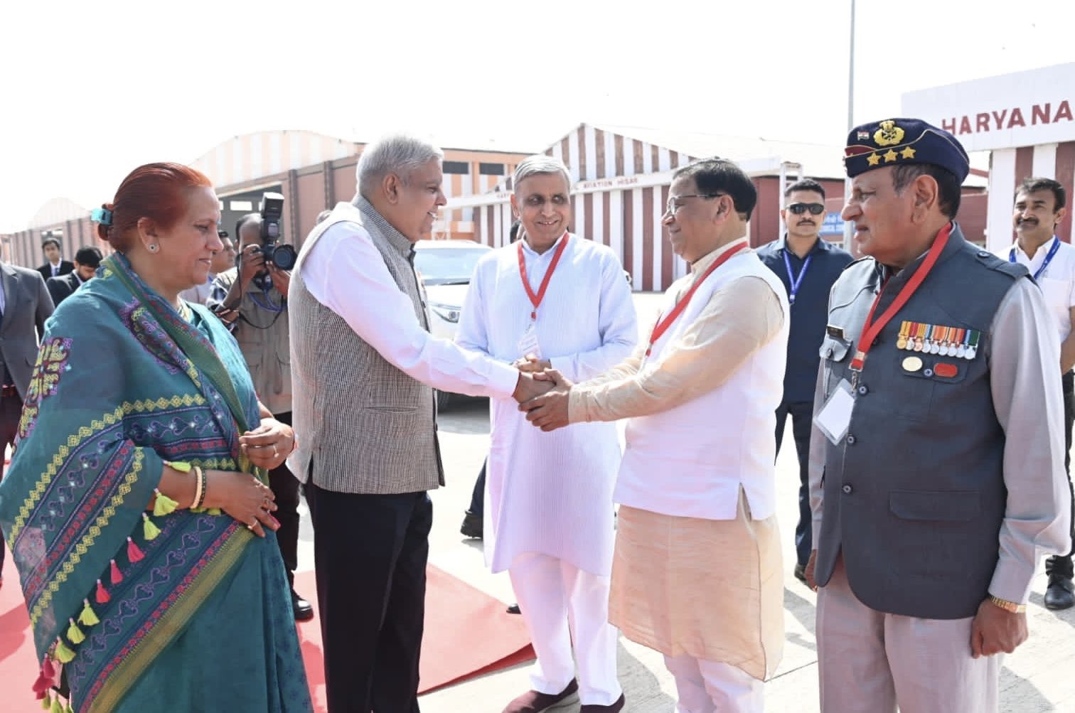 The Vice-President, Shri Jagdeep Dhankhar and Dr Sudesh Dhankhar being welcomed by Shri Jai Parkash Dalal, Agriculture Minister, Government of Haryana, Dr. Kamal Gupta, Minister Urban Local Bodies, Government of Haryana, Shri Brijendra Singh, MP Hisar and Lt.Gen. (Dr.) D. P. Vats (Retd.), MP, Rajya Sabha on their arrival in Hisar, Haryana on October 8, 2023.