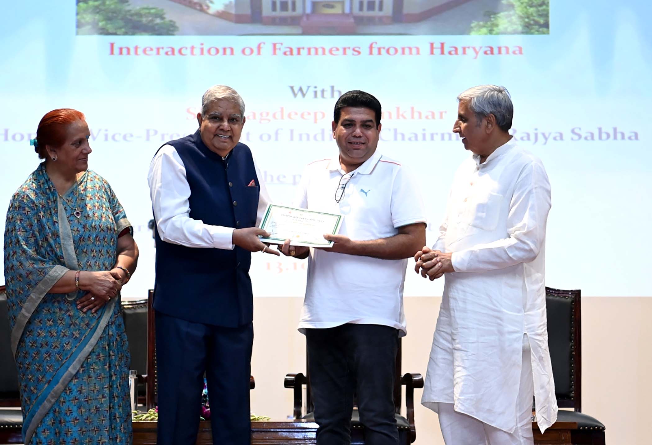 The Vice-President, Shri Jagdeep Dhankhar felicitating the progressive farmers from Haryana who came to visit Parliament House in New Delhi on October 13, 2023.