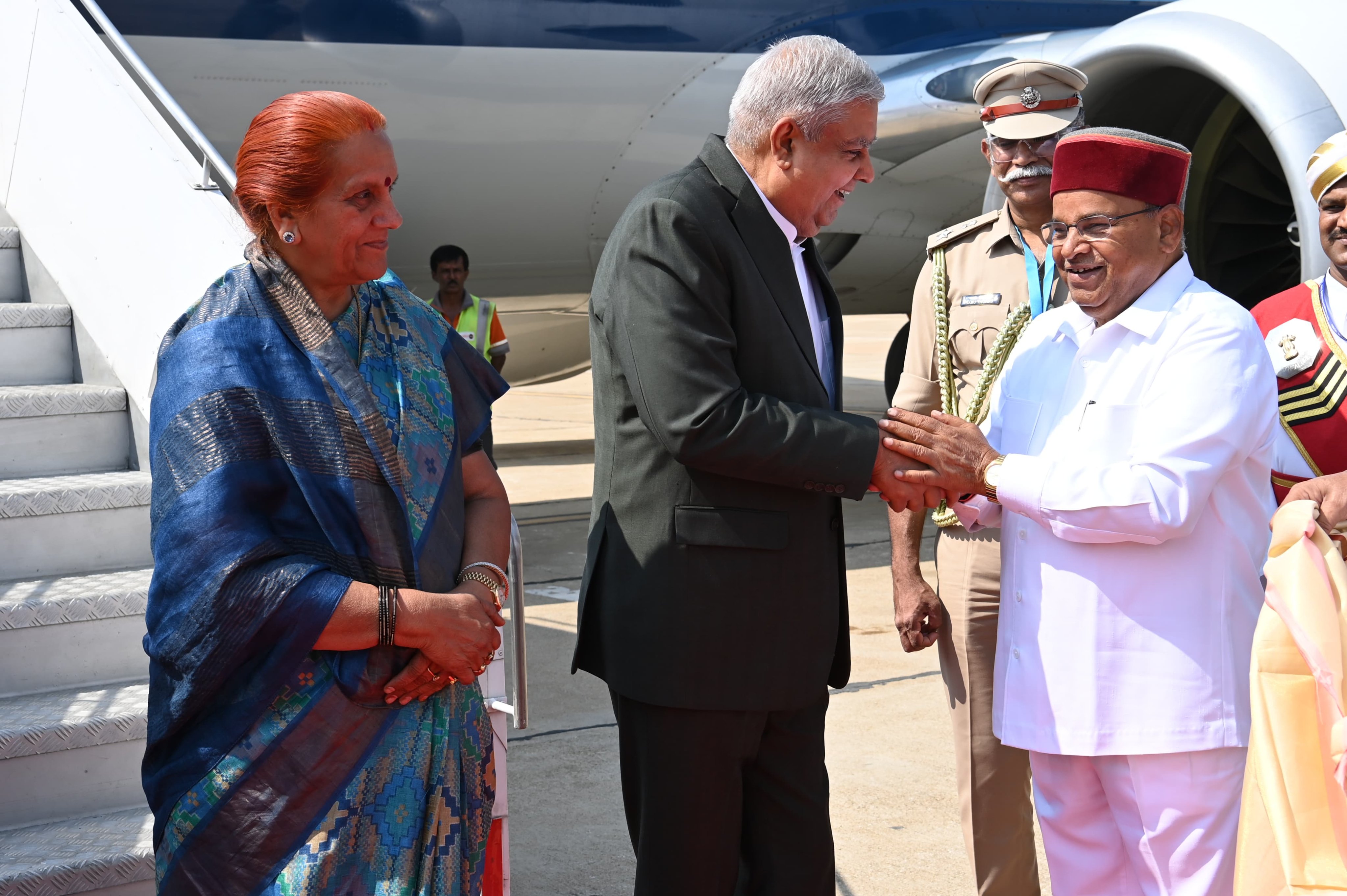 The Vice-President, Shri Jagdeep Dhankhar and Dr. Sudesh Dhankhar being welcomed by Governor of Karnataka, Shri Thaawarchand Gehlot and other dignitaries on their arrival in Bengaluru, Karnataka on March 8, 2024.