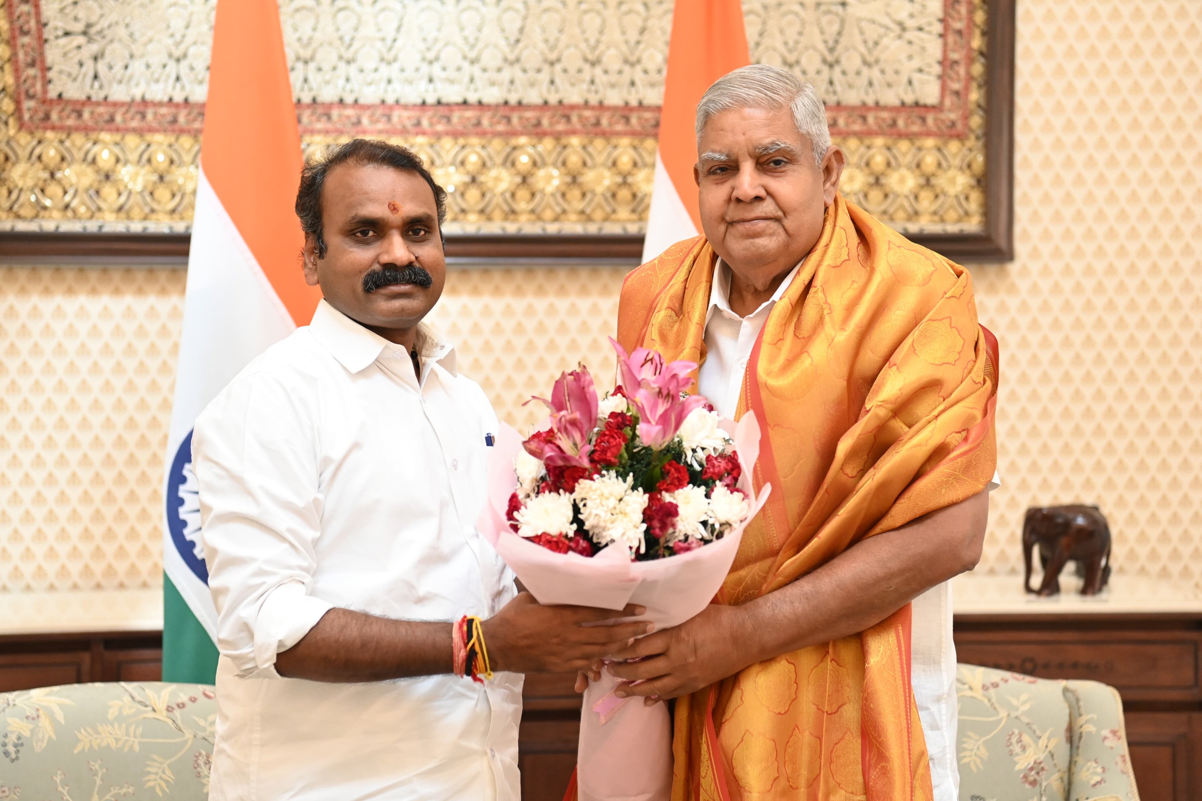 Dr. L Murugan, Union Minister of State for Ministry of Information and Broadcasting, and Ministry of Parliamentary Affairs called on the Vice-President, Shri Jagdeep Dhankhar at Vice-President's Enclave in New Delhi on June 12, 2024