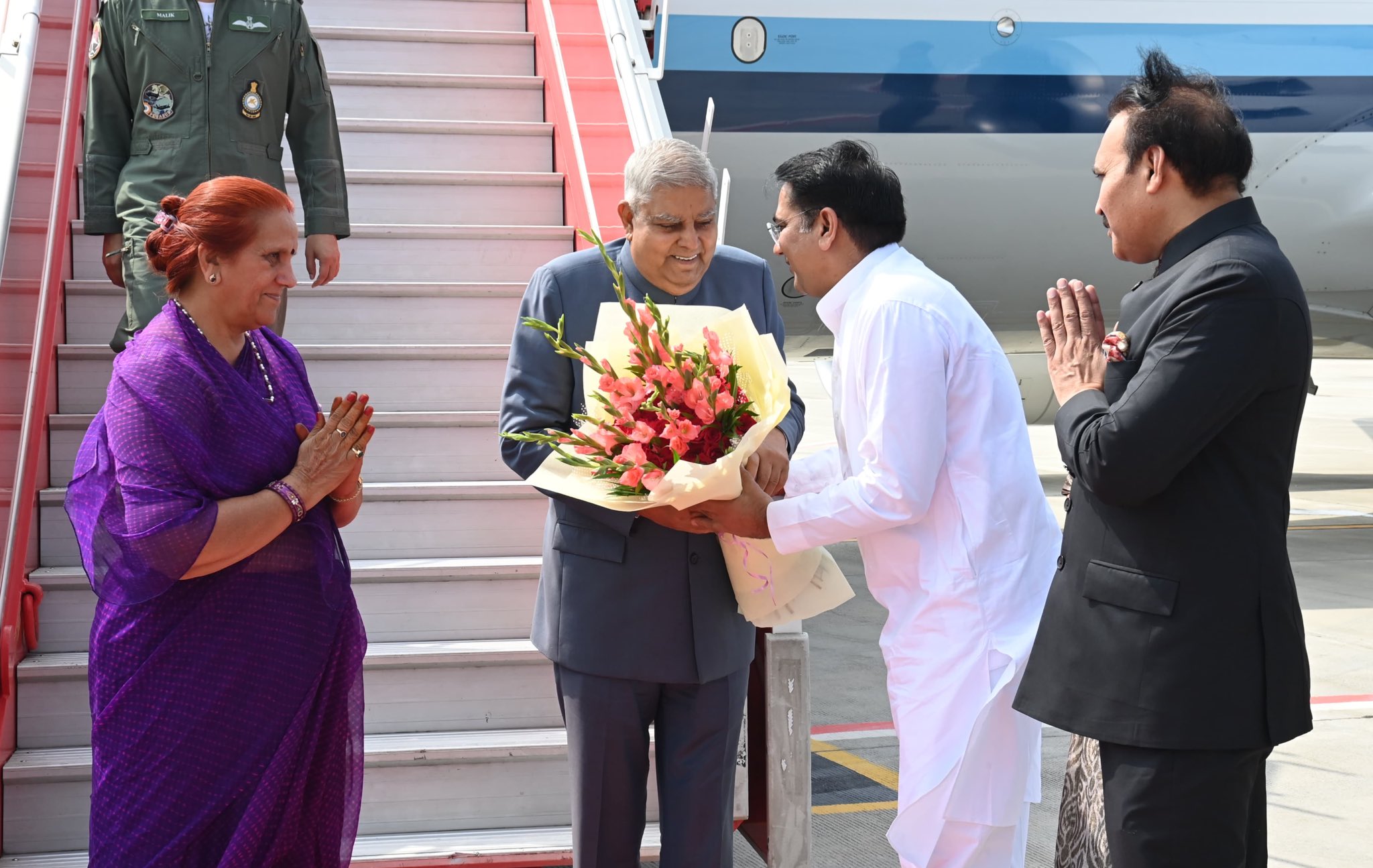 The Vice-President, Shri Jagdeep Dhankhar and Dr. Sudesh Dhankhar  being welcomed by Shri Suresh Singh Rawat, Minister of Water Resources, Government of Rajasthan and other dignitaries on their arrival in Jaipur, Rajasthan on August 18, 2024.