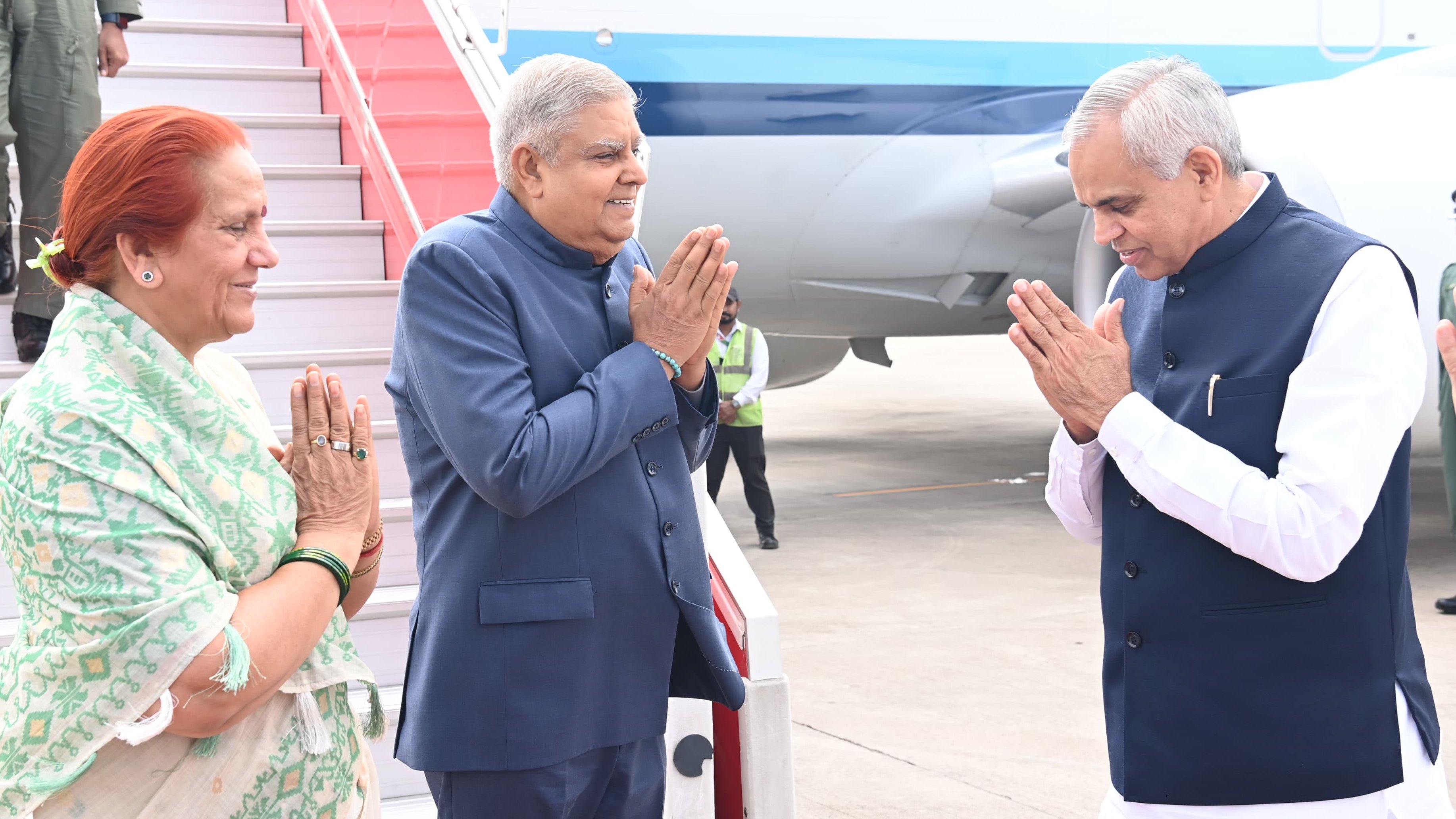 The Vice-President, Shri Jagdeep Dhankhar and Dr. Sudesh Dhankhar being welcomed by Shri Acharya Devvrat, Governor of Gujarat, Shri Bhupendra Patel, Chief Minister of Gujarat and other dignitaries on their arrival in Ahmedabad, Gujarat on September 18, 2024.