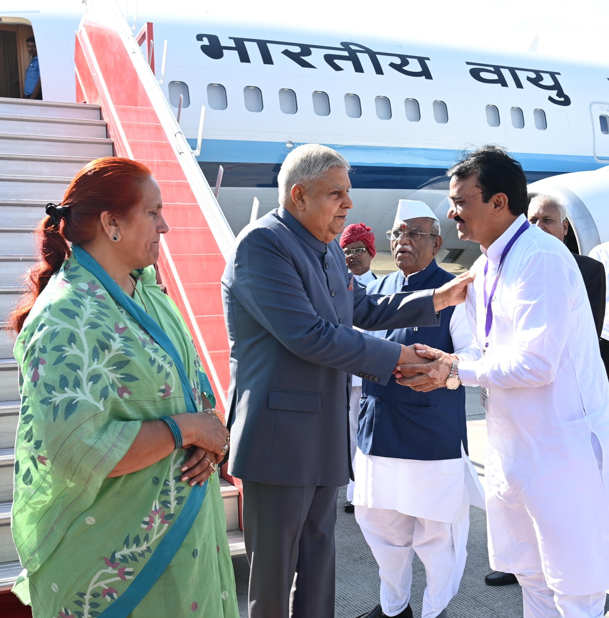 The Vice-President, Shri Jagdeep Dhankhar and Dr Sudesh Dhankhar being welcomed by Shri Haribhau Kisanrao Bagde, Governor of Rajasthan, Shri Prem Chand Bairwa, Deputy Chief Minister of Rajasthan along with other dignitaries on their arrival in Jaipur, Rajasthan on October 15, 2024.