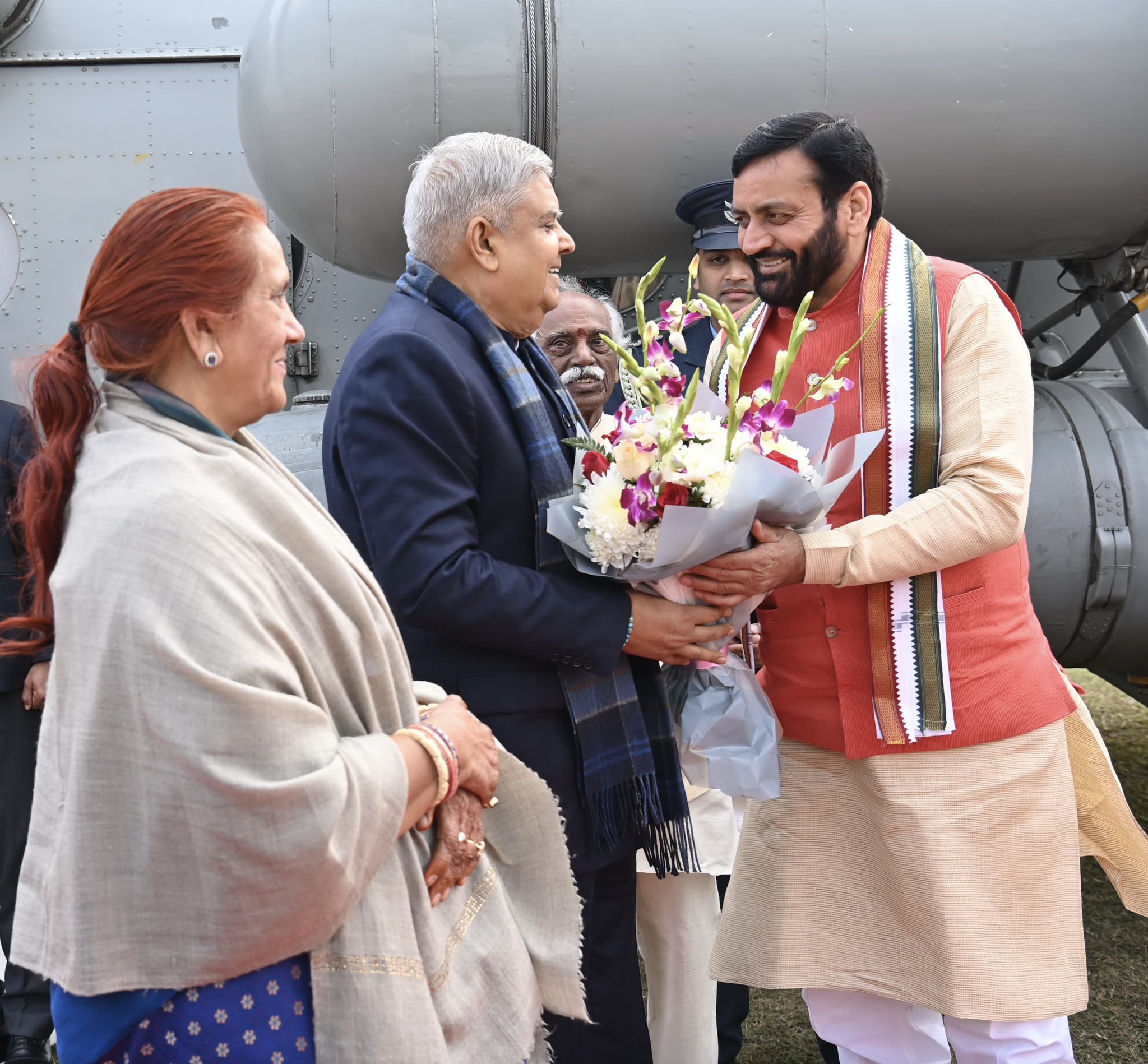 The Vice-President, Shri Jagdeep Dhankhar & Dr. Sudesh Dhankhar being welcomed by Governor of Haryana, Shri Bandaru Dattatreya, Chief Minister of Haryana, Shri Nayab Singh Saini, and other dignitaries on their arrival in Kurukshetra, Haryana on December 8, 2024.