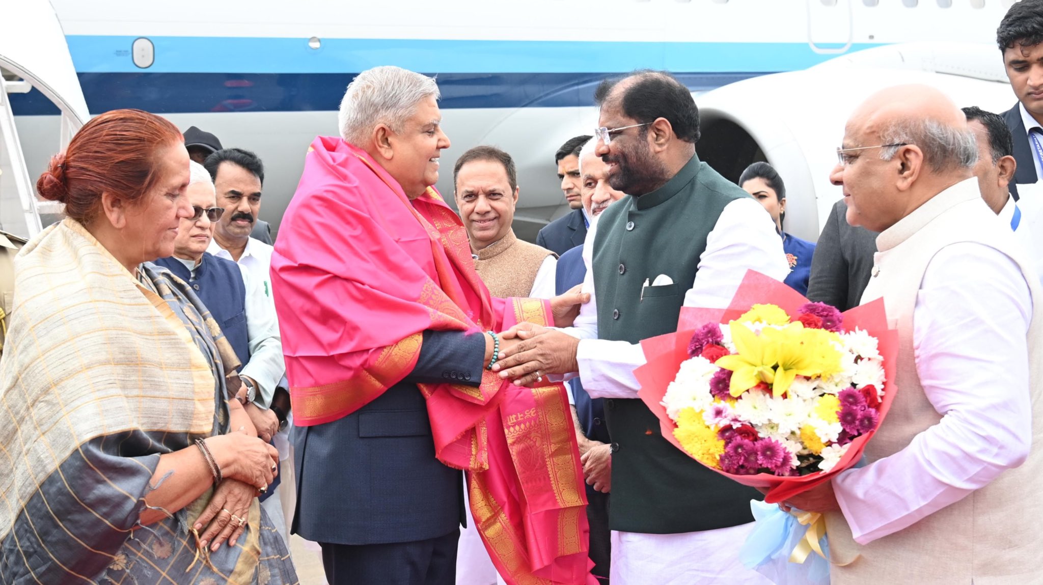 The Vice-President, Shri Jagdeep Dhankhar and Dr. Sudesh Dhankhar being welcomed by the Governor of Telangana, Shri Jishnu Dev Varma, Minister, Government of Telangana, Shri Jupally Krishna Rao, and Members of Parliament (Rajya Sabha) and other dignitaries on their arrival in Hyderabad, Telangana  on December 25, 2024.