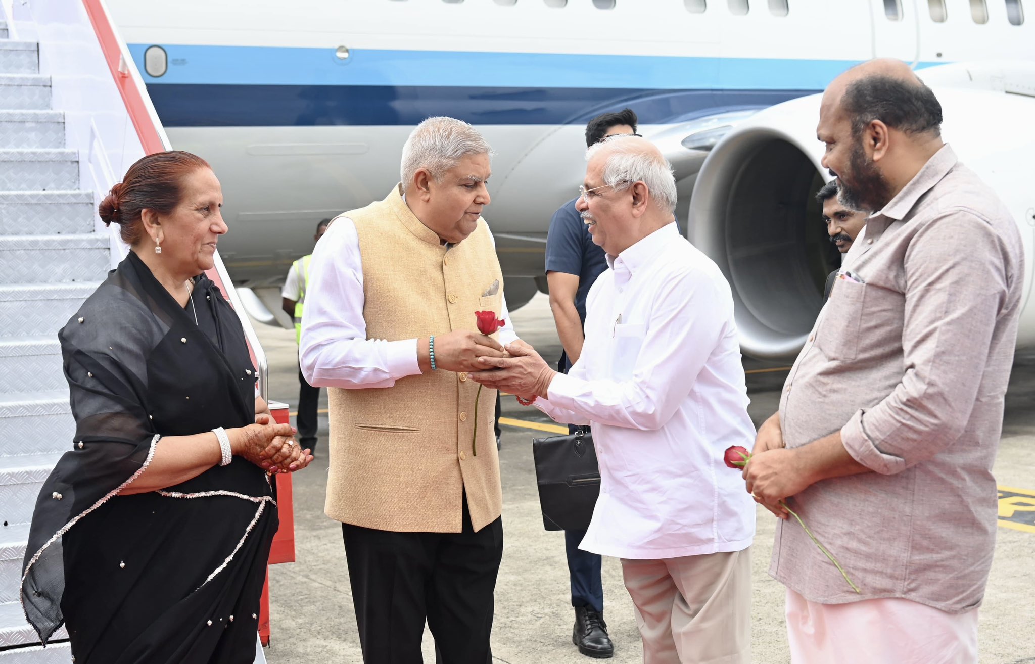 The Vice-President, Shri Jagdeep Dhankhar and Dr. Sudesh Dhankhar being welcomed by Shri Rajendra Vishwanath Arlekar, Governor of Kerala, Shri P Rajeeve, Minister, Government of Kerala, Shri Haris Beeran, Member of Rajya Sabha and other dignitaries on their arrival in Kochi, Kerala on July 6, 2025. 