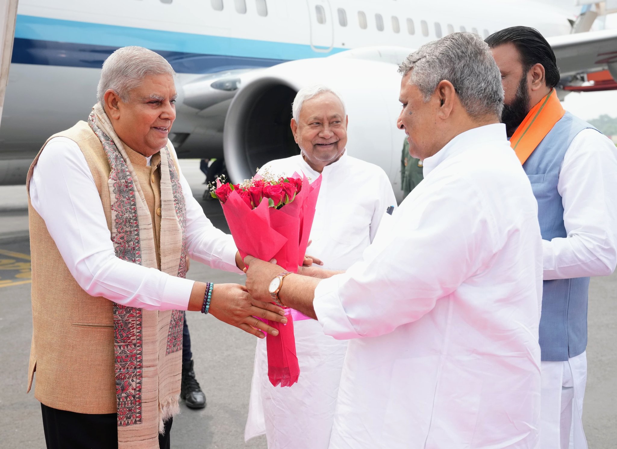 The Vice-President, Shri Jagdeep Dhankhar being welcomed by Shri Nitish Kumar, Chief Minister of Bihar, Shri Samrat Choudhary, Deputy Chief Minister of Bihar, Shri Vijay Choudhary, Minister, Government of Bihar and other dignitaries on his arrival in Patna, Bihar on June 24, 2025.
