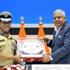 The Vice President, Shri Jagdeep Dhankhar  accepting a memento at  Border Security Force Investiture Ceremony and Rustamji Memorial Lecture 2023 at Vigyan Bhawan in New Delhi on May 24, 2023.